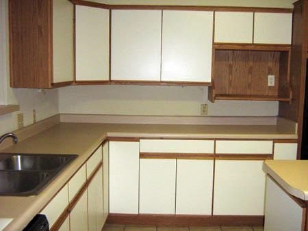 Dated Condo - Wood Panel Kitchen