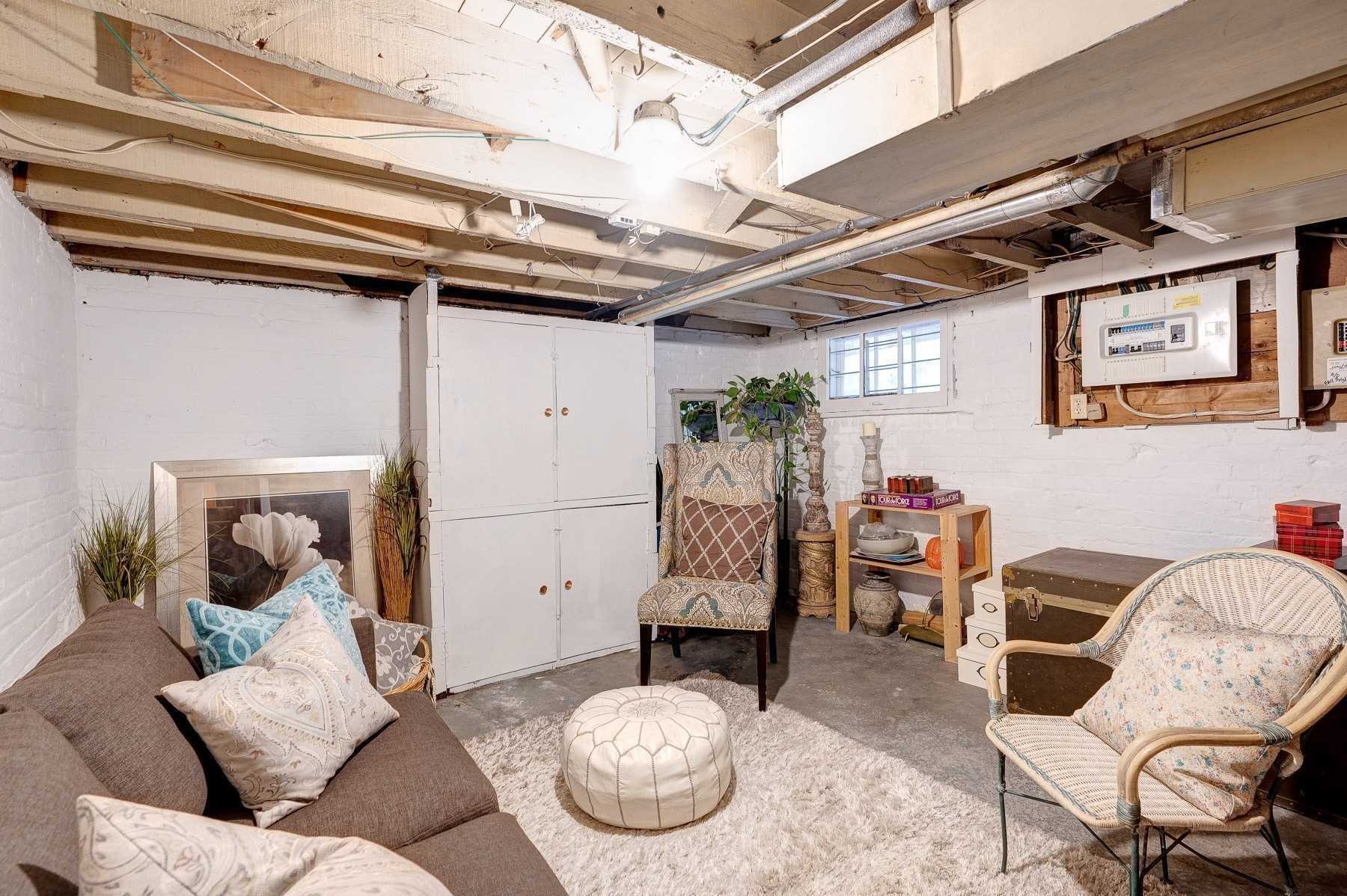 living room in unfinished basement